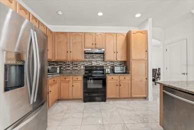 Welcome to this stunning 6-bedroom, 4.5-bath home in the heart on Mayfair Country Club in Florida - for sale on GolfHomes.com, golf home, golf lot
