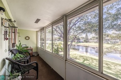 This charming, partially furnished, two bedroom, one and a half on Hillsboro Pines Golf in Florida - for sale on GolfHomes.com, golf home, golf lot
