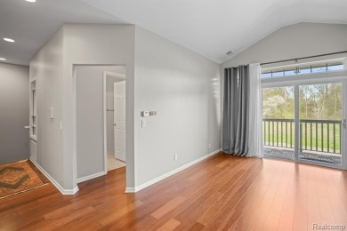 Welcome to this beautifully updated upper-level 2-bedroom on The Captains Club At Woodfield in Michigan - for sale on GolfHomes.com, golf home, golf lot