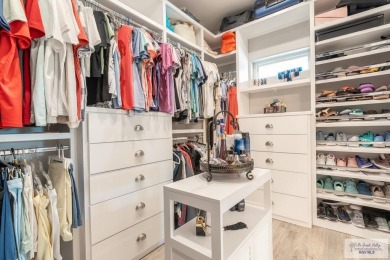 Spacious garage is 1242 sq ft which includes two car garage (24 on South Padre Island Golf Club in Texas - for sale on GolfHomes.com, golf home, golf lot
