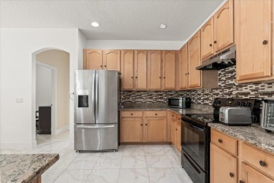 Welcome to this stunning 6-bedroom, 4.5-bath home in the heart on Mayfair Country Club in Florida - for sale on GolfHomes.com, golf home, golf lot