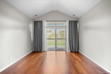 Welcome to this beautifully updated upper-level 2-bedroom on The Captains Club At Woodfield in Michigan - for sale on GolfHomes.com, golf home, golf lot