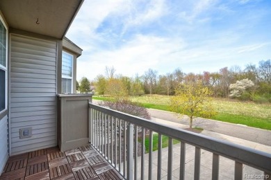 Welcome to this beautifully updated upper-level 2-bedroom on The Captains Club At Woodfield in Michigan - for sale on GolfHomes.com, golf home, golf lot