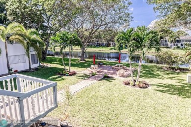 This charming, partially furnished, two bedroom, one and a half on Hillsboro Pines Golf in Florida - for sale on GolfHomes.com, golf home, golf lot
