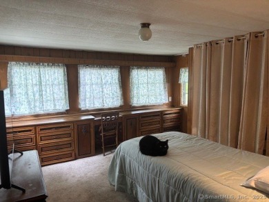 Nice Mobile Home In Country Club Estates. Home offers covered on The University Club of Connecticut in Connecticut - for sale on GolfHomes.com, golf home, golf lot