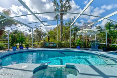 Exquisite 3-Bedroom, 2-Bath Pool Home in prestigious 24/7 staff on Spruce Creek Golf Club in Florida - for sale on GolfHomes.com, golf home, golf lot