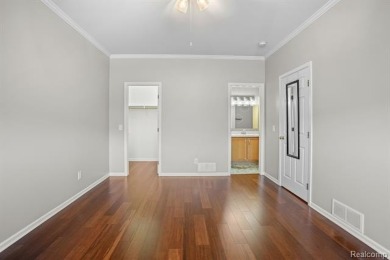 Welcome to this beautifully updated upper-level 2-bedroom on The Captains Club At Woodfield in Michigan - for sale on GolfHomes.com, golf home, golf lot