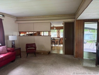 Nice Mobile Home In Country Club Estates. Home offers covered on The University Club of Connecticut in Connecticut - for sale on GolfHomes.com, golf home, golf lot