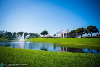 This charming, partially furnished, two bedroom, one and a half on Hillsboro Pines Golf in Florida - for sale on GolfHomes.com, golf home, golf lot