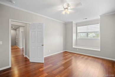 Welcome to this beautifully updated upper-level 2-bedroom on The Captains Club At Woodfield in Michigan - for sale on GolfHomes.com, golf home, golf lot
