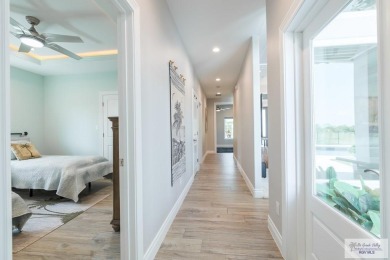 Spacious garage is 1242 sq ft which includes two car garage (24 on South Padre Island Golf Club in Texas - for sale on GolfHomes.com, golf home, golf lot