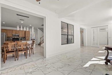 Welcome to this stunning 6-bedroom, 4.5-bath home in the heart on Mayfair Country Club in Florida - for sale on GolfHomes.com, golf home, golf lot