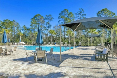 Preserve views, modern finishes, and low-maintenance living come on Slammer and Squire Golf Course in Florida - for sale on GolfHomes.com, golf home, golf lot