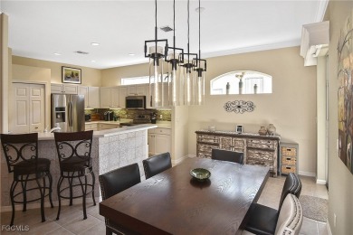FULL GOLF MEMBERSHIP! Lake front pool home in the Legends Golf & on Legends Golf and Country Club in Florida - for sale on GolfHomes.com, golf home, golf lot