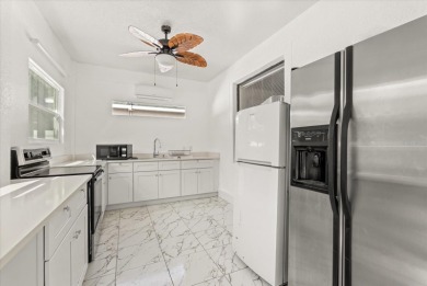 Welcome to this stunning 6-bedroom, 4.5-bath home in the heart on Mayfair Country Club in Florida - for sale on GolfHomes.com, golf home, golf lot