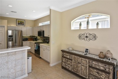 FULL GOLF MEMBERSHIP! Lake front pool home in the Legends Golf & on Legends Golf and Country Club in Florida - for sale on GolfHomes.com, golf home, golf lot