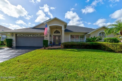 Exquisite 3-Bedroom, 2-Bath Pool Home in prestigious 24/7 staff on Spruce Creek Golf Club in Florida - for sale on GolfHomes.com, golf home, golf lot