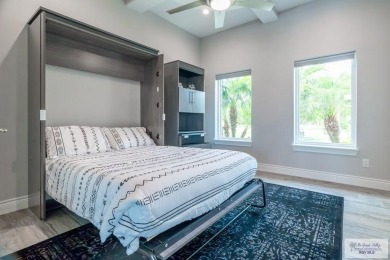 Spacious garage is 1242 sq ft which includes two car garage (24 on South Padre Island Golf Club in Texas - for sale on GolfHomes.com, golf home, golf lot