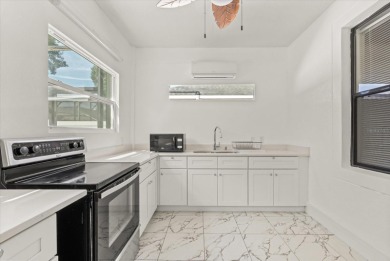 Welcome to this stunning 6-bedroom, 4.5-bath home in the heart on Mayfair Country Club in Florida - for sale on GolfHomes.com, golf home, golf lot