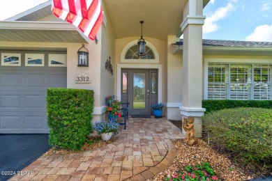 Exquisite 3-Bedroom, 2-Bath Pool Home in prestigious 24/7 staff on Spruce Creek Golf Club in Florida - for sale on GolfHomes.com, golf home, golf lot