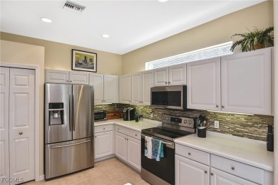 FULL GOLF MEMBERSHIP! Lake front pool home in the Legends Golf & on Legends Golf and Country Club in Florida - for sale on GolfHomes.com, golf home, golf lot
