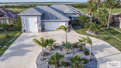 Spacious garage is 1242 sq ft which includes two car garage (24 on South Padre Island Golf Club in Texas - for sale on GolfHomes.com, golf home, golf lot