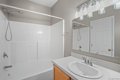 Welcome to this beautifully updated upper-level 2-bedroom on The Captains Club At Woodfield in Michigan - for sale on GolfHomes.com, golf home, golf lot