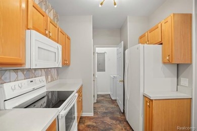 Welcome to this beautifully updated upper-level 2-bedroom on The Captains Club At Woodfield in Michigan - for sale on GolfHomes.com, golf home, golf lot
