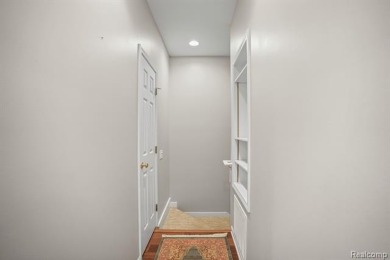 Welcome to this beautifully updated upper-level 2-bedroom on The Captains Club At Woodfield in Michigan - for sale on GolfHomes.com, golf home, golf lot