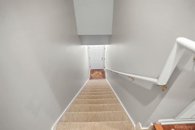 Welcome to this beautifully updated upper-level 2-bedroom on The Captains Club At Woodfield in Michigan - for sale on GolfHomes.com, golf home, golf lot