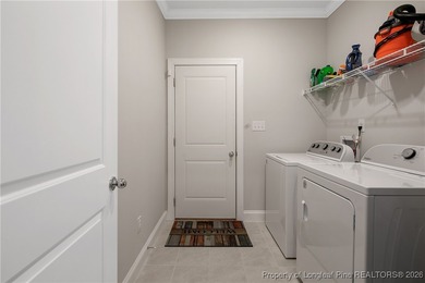 This beautifully maintained residence offers a refined on Anderson Creek Golf Club in North Carolina - for sale on GolfHomes.com, golf home, golf lot