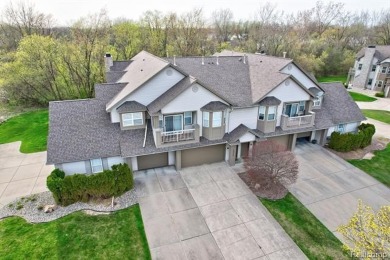 Welcome to this beautifully updated upper-level 2-bedroom on The Captains Club At Woodfield in Michigan - for sale on GolfHomes.com, golf home, golf lot
