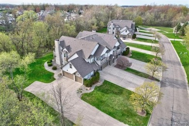 Welcome to this beautifully updated upper-level 2-bedroom on The Captains Club At Woodfield in Michigan - for sale on GolfHomes.com, golf home, golf lot