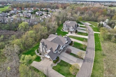 Welcome to this beautifully updated upper-level 2-bedroom on The Captains Club At Woodfield in Michigan - for sale on GolfHomes.com, golf home, golf lot