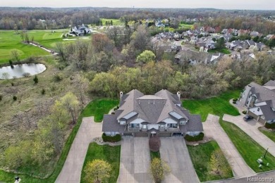 Welcome to this beautifully updated upper-level 2-bedroom on The Captains Club At Woodfield in Michigan - for sale on GolfHomes.com, golf home, golf lot
