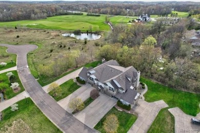 Welcome to this beautifully updated upper-level 2-bedroom on The Captains Club At Woodfield in Michigan - for sale on GolfHomes.com, golf home, golf lot