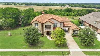 Luxurious amenities abound in this custom home.  Located on .70 on The Bridges Golf Club in Texas - for sale on GolfHomes.com, golf home, golf lot