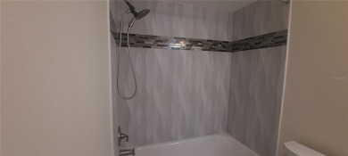 Very nice villa ready to move in as is, or a great clean palette on Lansbrook Golf Club in Florida - for sale on GolfHomes.com, golf home, golf lot