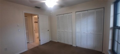 Very nice villa ready to move in as is, or a great clean palette on Lansbrook Golf Club in Florida - for sale on GolfHomes.com, golf home, golf lot