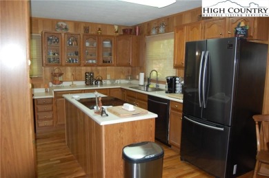 Breathtaking Living in the Blue Ridge Mountains of North on Land Harbor Golf Course in North Carolina - for sale on GolfHomes.com, golf home, golf lot