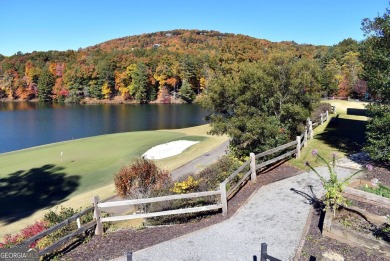 Tucked away in the serene beauty of Big Canoe, this heavily on Big Canoe Golf Club - Cherokee in Georgia - for sale on GolfHomes.com, golf home, golf lot