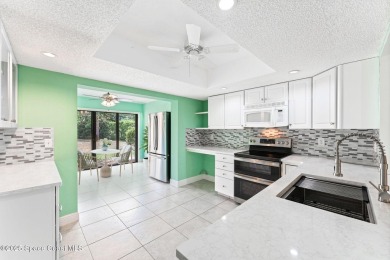Beautiful end-unit townhome in a prime Suntree location offering on Suntree Country Club in Florida - for sale on GolfHomes.com, golf home, golf lot