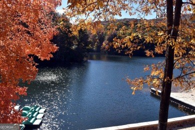 Tucked away in the serene beauty of Big Canoe, this heavily on Big Canoe Golf Club - Cherokee in Georgia - for sale on GolfHomes.com, golf home, golf lot