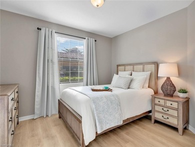 MUST SEE popular END UNIT TERRACE CONDO with great WESTERN views on Bonita National Golf Course in Florida - for sale on GolfHomes.com, golf home, golf lot