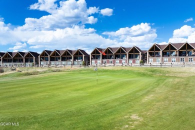 Enjoy sweeping mountain and golf course views from the covered on Grand Elk Ranch and Club in Colorado - for sale on GolfHomes.com, golf home, golf lot