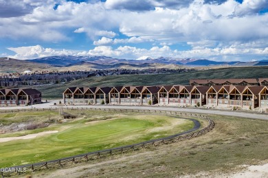 Enjoy sweeping mountain and golf course views from the covered on Grand Elk Ranch and Club in Colorado - for sale on GolfHomes.com, golf home, golf lot