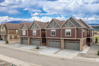 Enjoy sweeping mountain and golf course views from the covered on Grand Elk Ranch and Club in Colorado - for sale on GolfHomes.com, golf home, golf lot