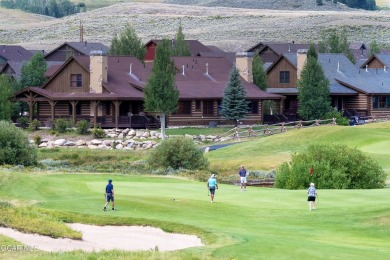 Enjoy sweeping mountain and golf course views from the covered on Grand Elk Ranch and Club in Colorado - for sale on GolfHomes.com, golf home, golf lot