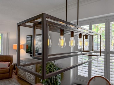 This is a TOTALLY UPDATED absolutely lovely VILLA in Monarch on  in Florida - for sale on GolfHomes.com, golf home, golf lot