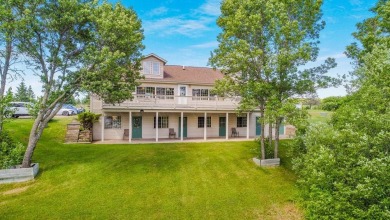 Nestled within the Chequamegon National Forest, this picturesque on Barker Lake Country Club in Wisconsin - for sale on GolfHomes.com, golf home, golf lot